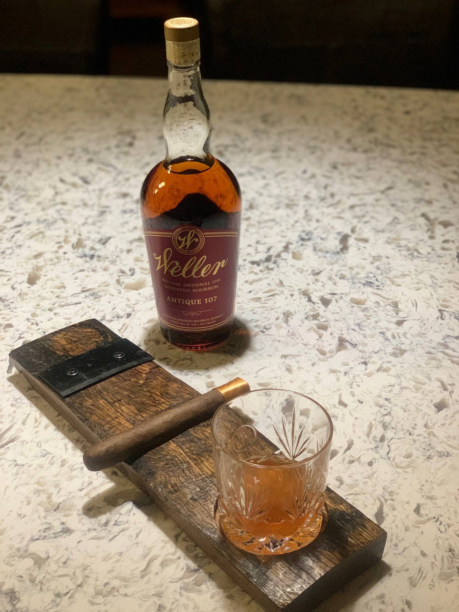 board with bottle and 2 glasses